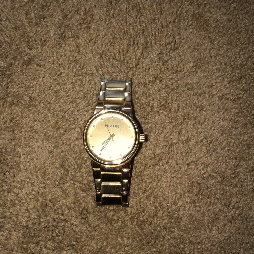 Gold color Nixon watch